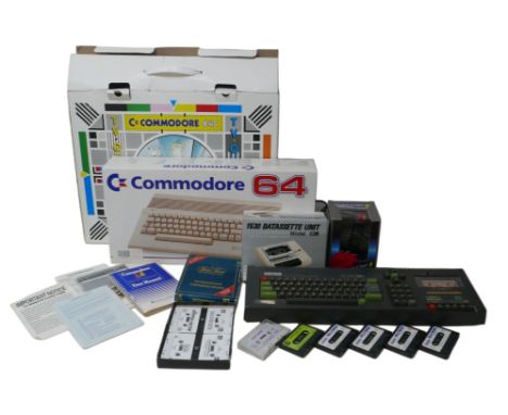 A Commodore C64C Hollywood/TV Quiz pack, with C64 computer and manual, a Quickshot II joystick, a Commodore 1530 Datassette U