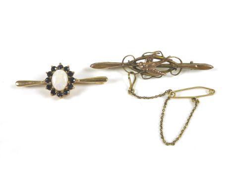 Two 9ct gold bar brooches, comprising a brooch with a swallow motif, 2g, 5.3cm wide, another brooch with an oval opal style s