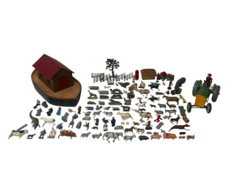 A collection of Timpo Toys and Britains lead farm animals and other models, including a Mettoy tin plate tractor with driver,