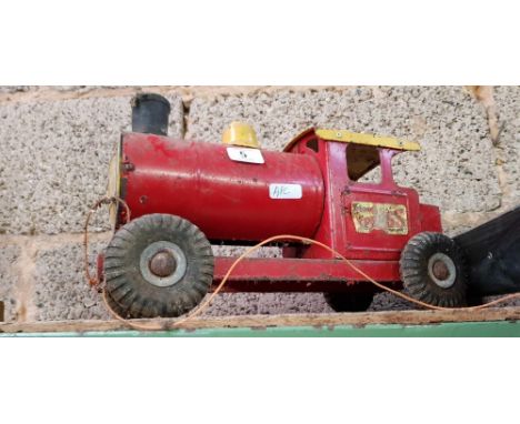 AN EARLY TIN PLATE TRIANG EXPRESS PULL-ALONG ENGINE