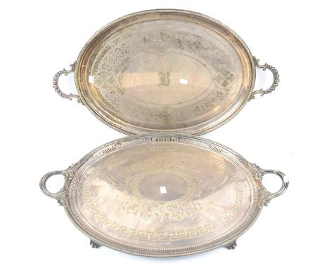 Large oval silver plated two handled serving tray with beaded border by Walker and Hall, 77cm x 48cm and another with pierced