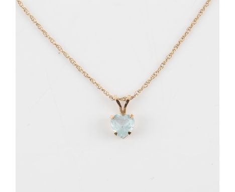 10ct  gold heart shaped topaz pendant on a 9ct gold chain