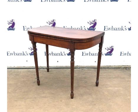 Mahogany foldover card table, 19th century, the rounded corners on ring turned tapering legs, H70.5 W86 D44.5 cm