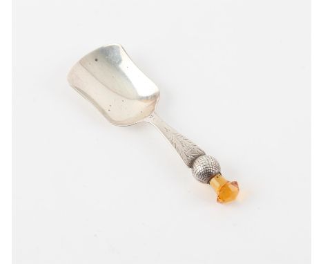 Thistle form caddy spoon set with amber coloured stone by WJS Birmingham 1902