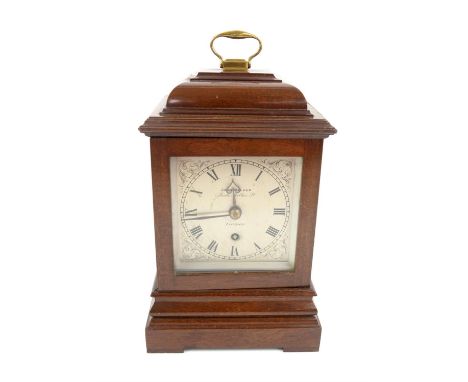 George III style mahogany table timepiece clock, the caddy top with brass handle over a silvered dial inscribed John Walker, 