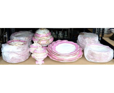 Royal Worcester dinner plates, with blue and printed borders, and an extensive Coalport dinner service with pink and gilt scr