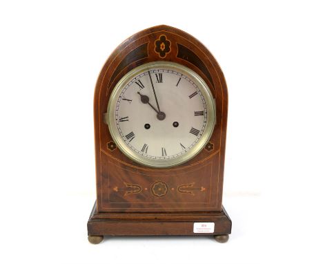 Early 20th century inlaid mahogany lancet arched mantel clock, with silvered dial, the twin train movement striking on two go