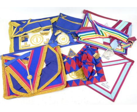 Collection of Masonic regalia and tools, including cable tow, squares, compasses, silver Chapter breast jewel, other breast j