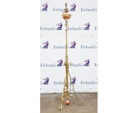 20th century brass and copper adjustable floor standing lamp converted from an oil lamp, on supports, 188cm high 