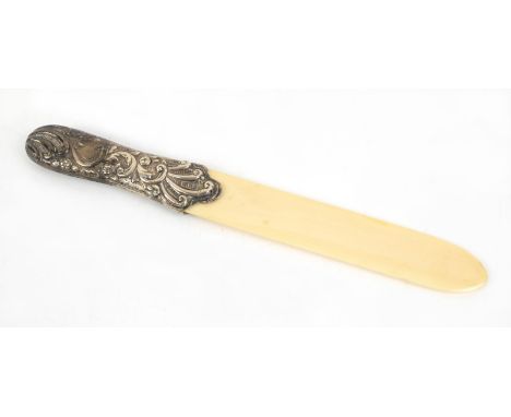 Victorian silver mounted and ivory page turner, with scrolling decoration, maker's mark 'TJ', London, 1889, 31cm long,PLEASE 