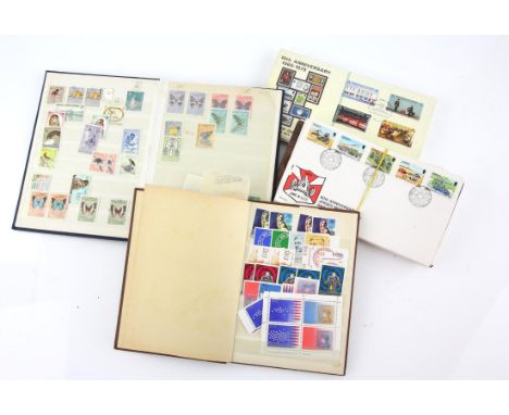 Two small stock books, Ireland and Papua New Gunea, loose First Day Covers including 1965 Battle of Britain cover signed Doug