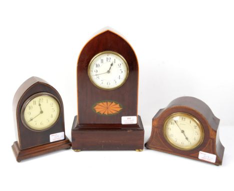 Early 20th century mahogany and boxwood lancet arched timepiece clock, with patera design and enamelled dial, balance wheel m