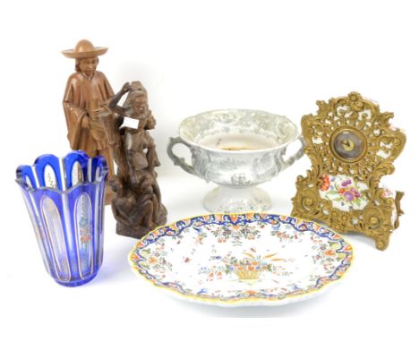 Continental porcelain and gilt metal mounted mantel clock, Bohemian glass vase, two carved wood figures, pottery dish and a t