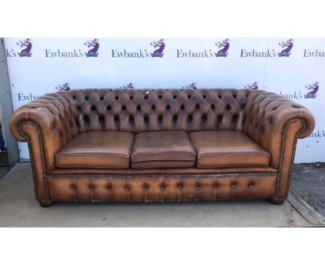 Three seat leather Chesterfield sofa, with turned pad feet, H73 W205 D86 cm