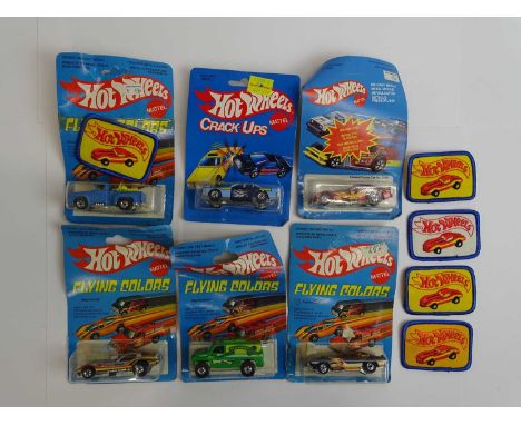 A group of MATTEL Hot Wheels Flying Colors and Crack Ups examples - circa 1970s - all sealed on original cards together with 