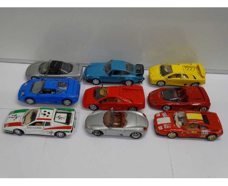 A group of unboxed 1:18 scale diecast cars by POLISTIL, BBURAGO &amp; MAISTO etc - F/G (18) This lot is being sold on behalf 