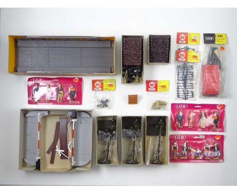 A group of LGB G scale accessories including bridge, level crossing, street lights, figures etc., all in original boxes/packe