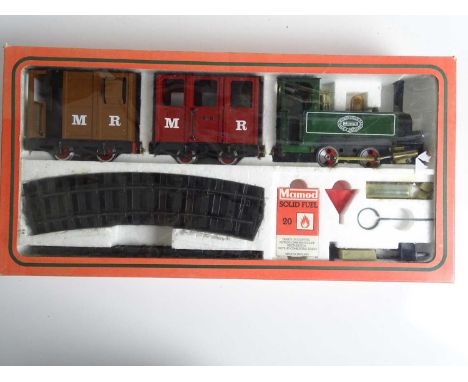 A MAMOD live steam 32mm scale Passenger Train set comprising 0-4-0 steam tank locomotive, passenger carriage, guard's van, tr