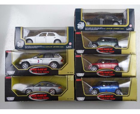 A group of boxed 1:18 scale diecast cars by ROAD TOUGH &amp; MOTOR MAX - VG/E in F/G boxes (7) This lot is being sold on beha