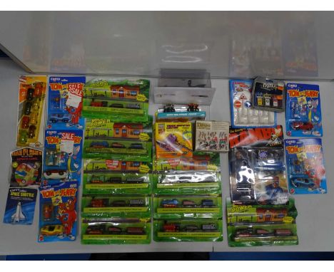 A mixed quantity of vintage toys by CORGI etc to include a COLECO 'The Enemy of Rambo - General Warhawk' figure - VG in P/G b