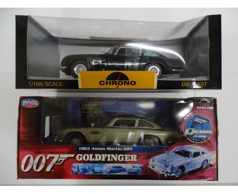 A pair of boxed 1:18 scale diecast Aston Martin cars comprising CHRONO and JOYRIDE 007 Goldfinger DB5 - VG/E in F/G boxes (2)