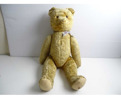 An unbranded vintage teddy bear - as lotted