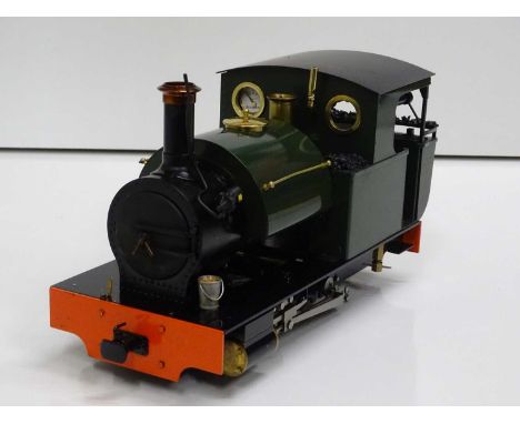 An ACCUCRAFT G scale 32mm live steam 0-4-0 steam saddle tank locomotive in green livery, fitted with R/C receiver and servos 