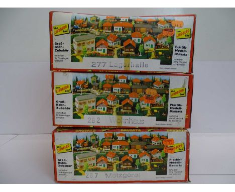 A group of THE LINDBERG LINE for LGB G scale vintage 1960s/early 70s plastic building kits comprising a butcher's shop, mansi