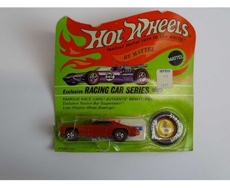 A MATTEL Hot Wheels Redline 1970s 'Mongoose' in red partially unsealed on a Racing Car Series card with button and sticker sh