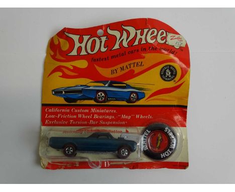 A MATTEL Hot Wheels Redline 1970 'Custom Fleetside' in blue partially unsealed on original card with button - G on G card (1)