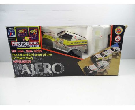 An ASAHI 1:16 scale radio controlled Mitsubishi Pajero, appears complete - G in G box