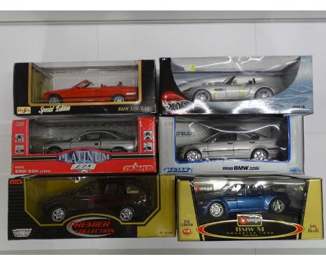 A group of boxed 1:18 scale diecast BMW cars by HOT WHEELS, MAISTO, MAJORETTE etc - VG/E in F/G boxes (6) This lot is being s