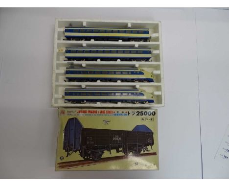 A part boxed LIMA HO gauge Japanese bullet train (some colour fading as is usual with this model) together with an OTAKI 1:50