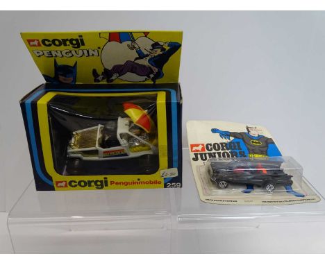 A pair of CORGI Batman themed items comprising a CORGI JUNIORS Batmobile on original bubble card (unsealed) together with a C