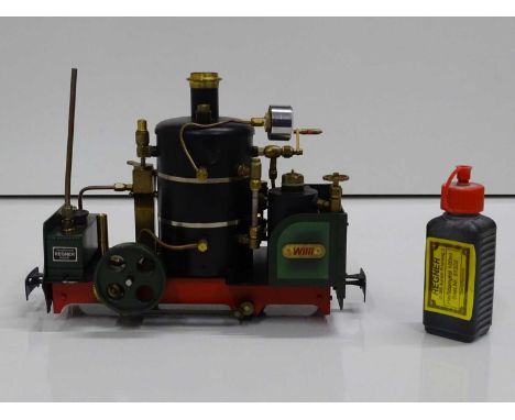 A REGNER G scale vertical boiler live steam locomotive 'Willi', 32mm but adjustable to 45mm gauge with a bottle of Regner ste