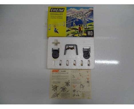 An EHEIM HO scale vintage chairlift kit, appears unused, complete apart from one chair, with instructions - VG in F/G box