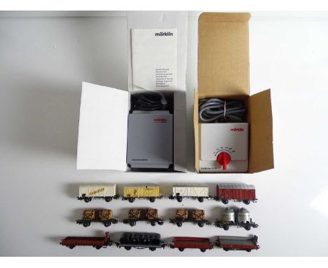 A group of MARKLIN HO gauge wagons (unboxed) together with a boxed pair of 60052 transformer and 6647 controller - VG in F/G 