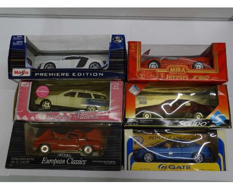 A group of boxed 1:18 scale diecast cars by MAISTO, ERTL, ANSON, SOLIDO, MIRA &amp; GATE - VG/E in F/G boxes (6) This lot is 