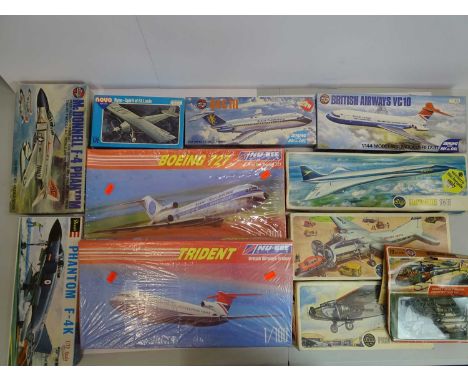 A group of mostly unbuilt plastic kits in various scales by AIRFIX, REVELL, NU-BEE etc - all aircraft examples - contents unc