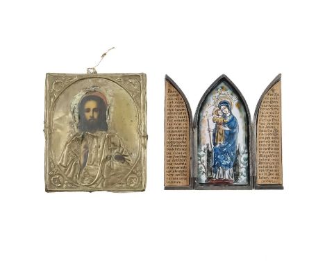 An orthodox icon. Depicting Christ with overlay brass mount 13.5cm x 11.5cm together with a folding travel icon with central 
