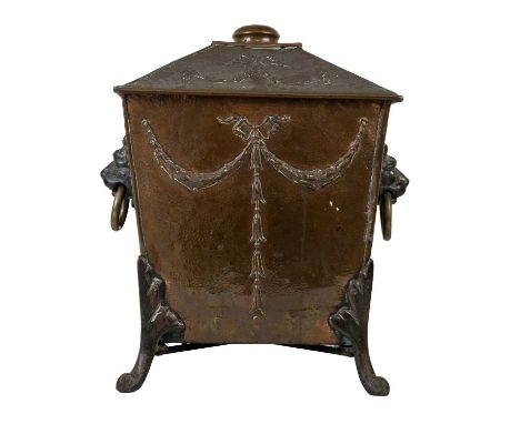 A Regency style square copper coal box and cover With repousse garland decoration twin lion mask ring handles on four support