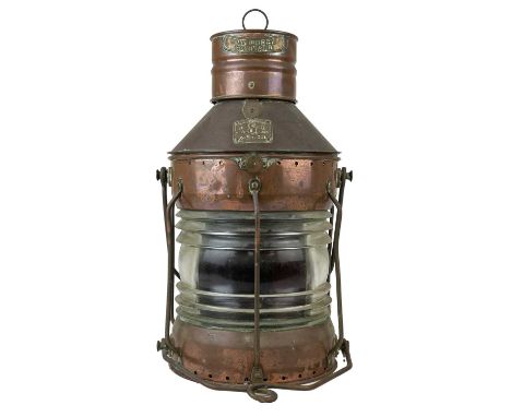 An early 20th century copper navigational light by Seahorse. Number 24480 Not Under Command, height 49cm.