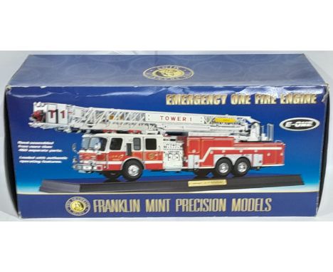 Franklin Mint, a boxed 1:32 scale "Emergency One" Fire Engine with Display Case. Conditions generally appear Good Plus with F