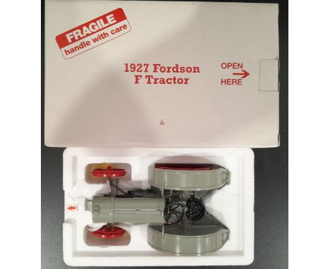 Danbury Mint a boxed 1/16 scale 1927 Fordson F Tractor (Grey/Red). Conditions generally appear Near Mint to Mint in generally