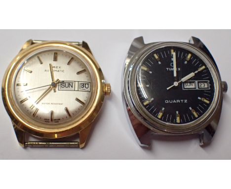 Two Timex wristwatch heads one automatic other quartz movement requiring battery 