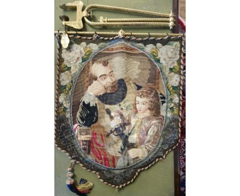 A Victorian tapestry hanging fire screen on articulated gilt metal frame, late 19th century, the tapestry panel with beaded d