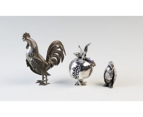 A selection of small silver and plated wares, to include; a silver belt buckle, a silver backed miniature hand mirror, a silv
