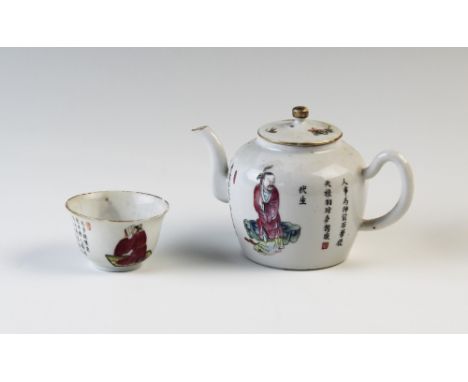 A Chinese porcelain Wu Shuang Pu teapot and tea bowl, each decorated in the famille rose palette, the teapot decorated with B