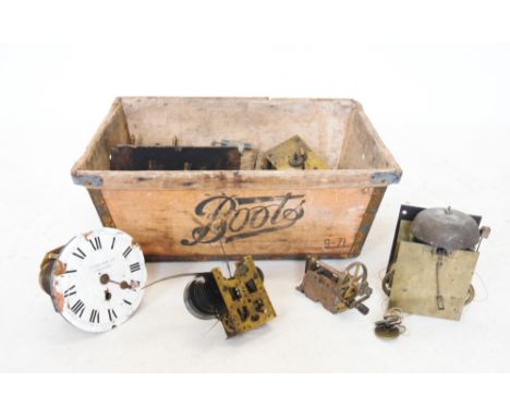 A collection of clock movements and parts to a vintage 'Boots' box, to include, an eight day longcase clock movement, a Chadb