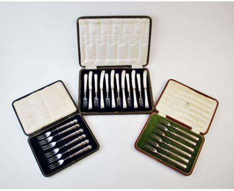 A cased set of six silver handled fruit knives and six forks,  Allen and Darwin circa 1910, along with a further cased set of